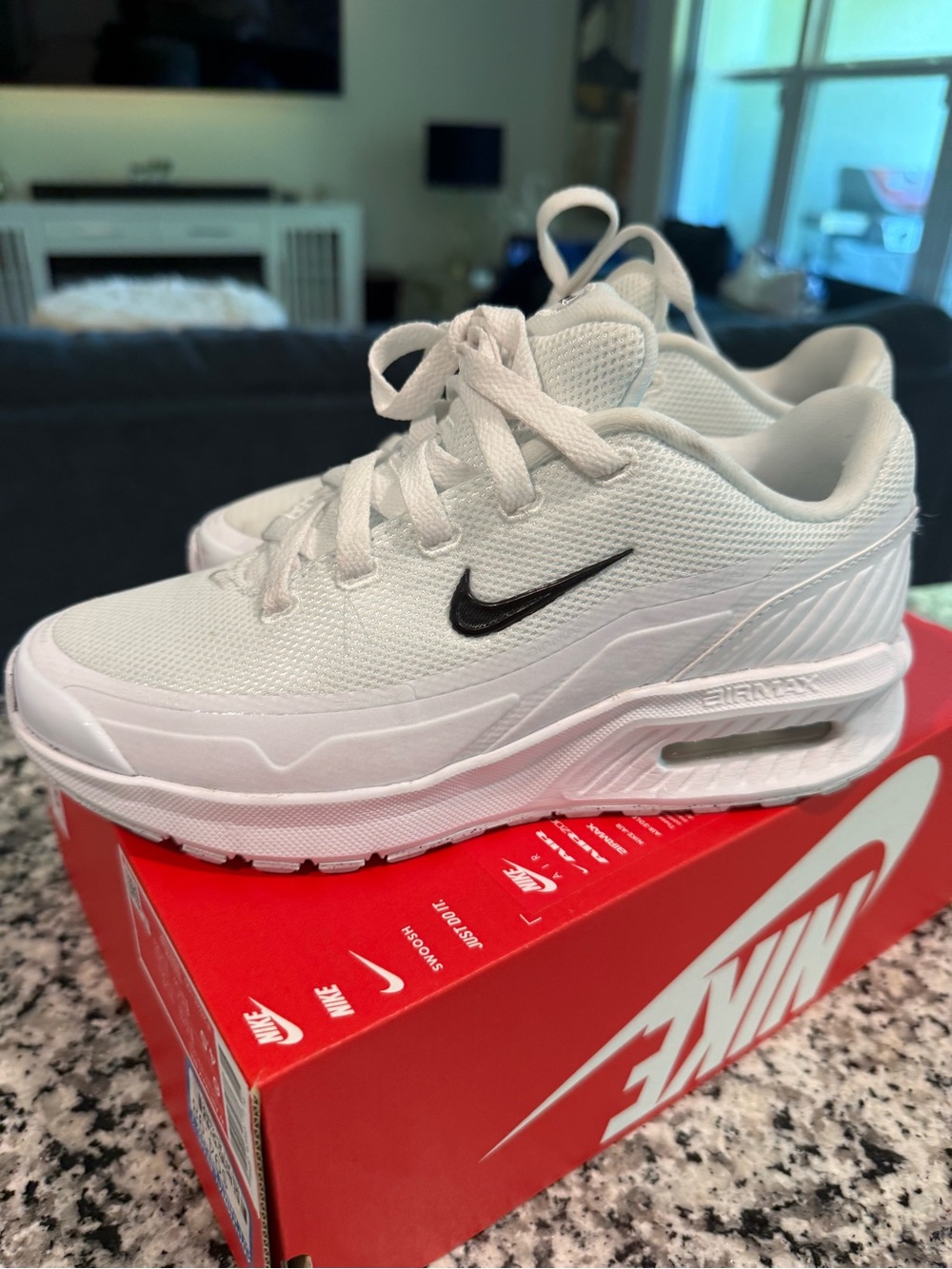 Nike White Sneakers with Black Swoosh